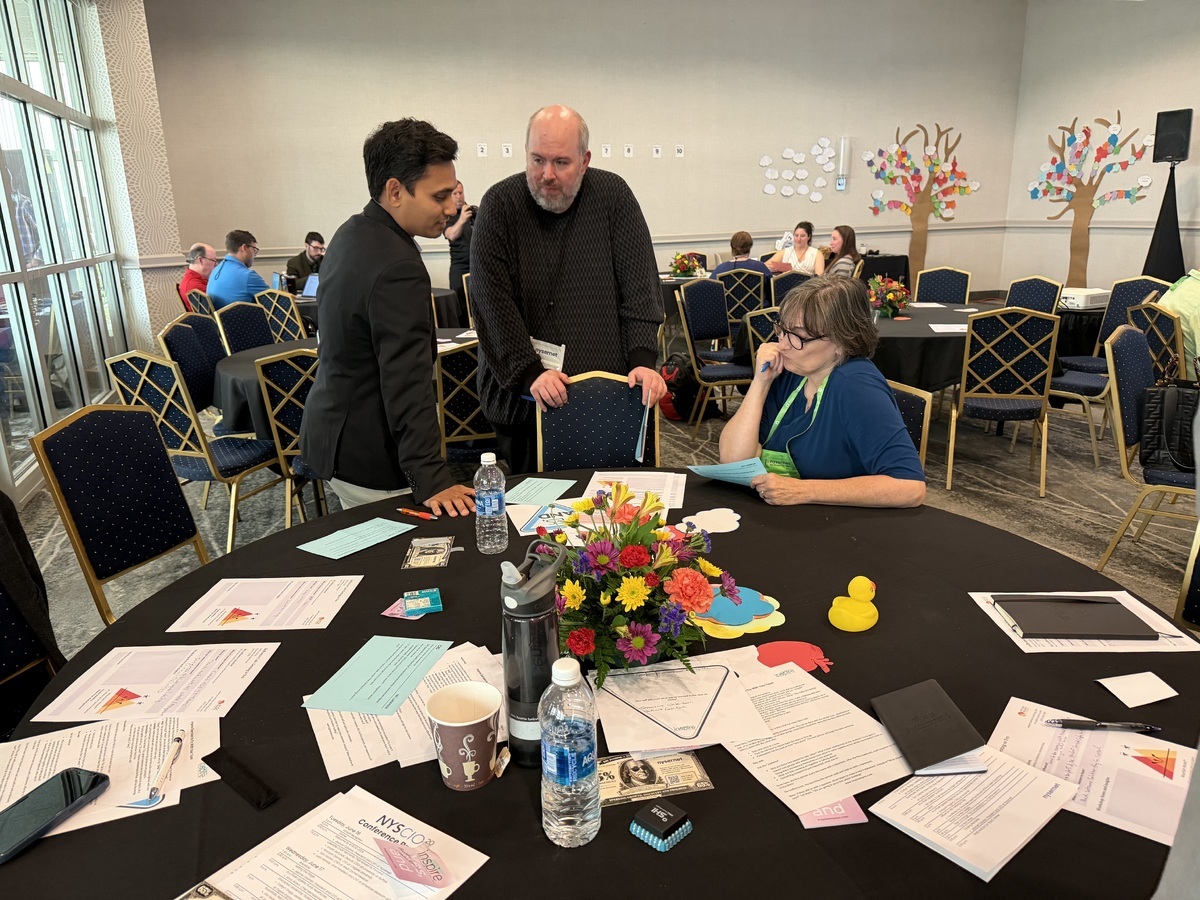 Nysernet members puzzle over a solution during the annual conference.