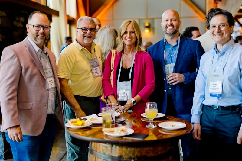 A group of Nysernet members pose for a photo during a reception at Nysernet's annual conference, NYSCIO.
